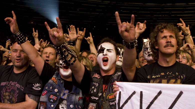 KISS fans rocking out at a concert in Berlin in 2008