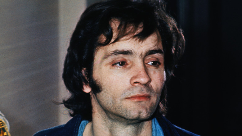 charles manson perp walk clean shaven