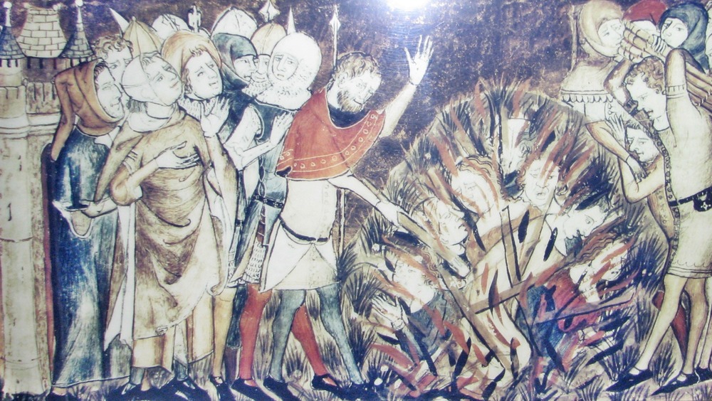 14th-century illustration of Jews burned