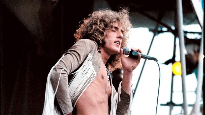 Roger Daltrey singing on stage