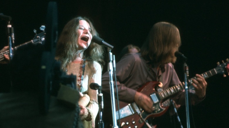 Janis Joplin singing on stage