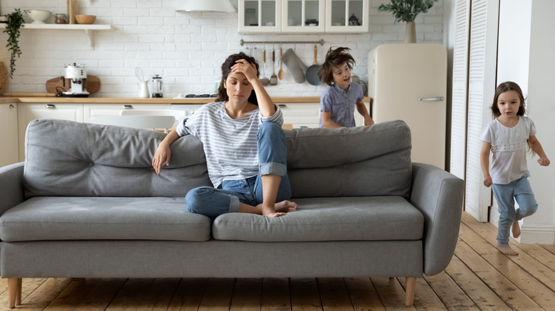 tired mother and kids