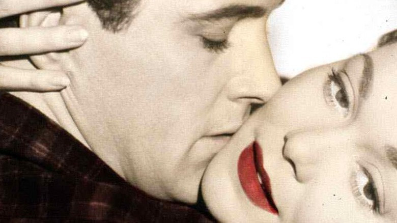 Rock Hudson in a rather chaste kiss