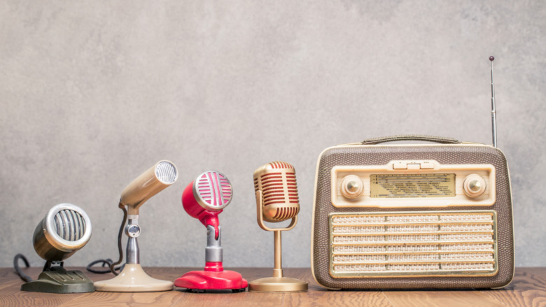 vintage radios with lined up microphones