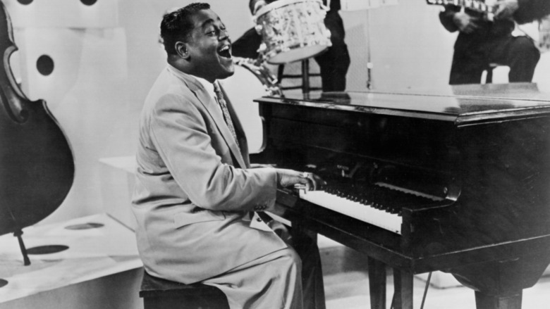 fats domino singing at the piano