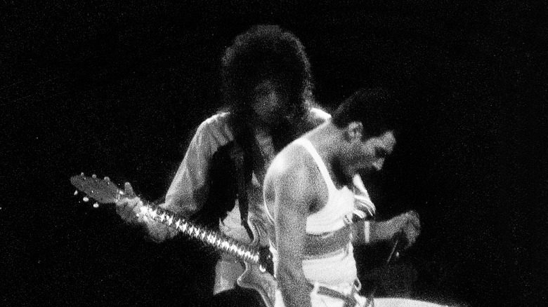 Freddie Mercury and Brian May performing