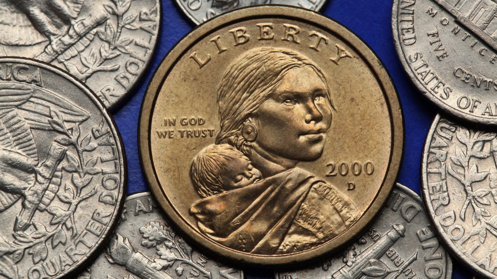 Sacagawea and her baby Jean-Baptiste on an American coin