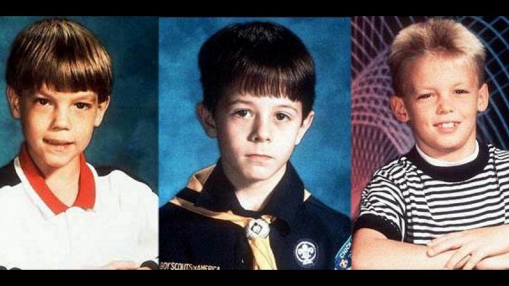 School photos of Christopher Byers, Michael Moore, and Stevie Branch