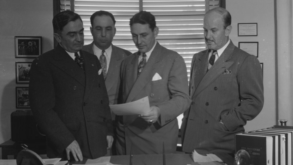 Authorities discuss the Zoot Suit Riots, 1943.Photographed left to right are Eugene Biscailuz (Los Angeles County Sheriff), Police Captain Thad Brown, Los Angeles District Attorney Fred N. Howser, and Carl Moritz.