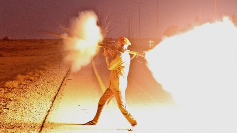 Libyan soldier firing an RPG