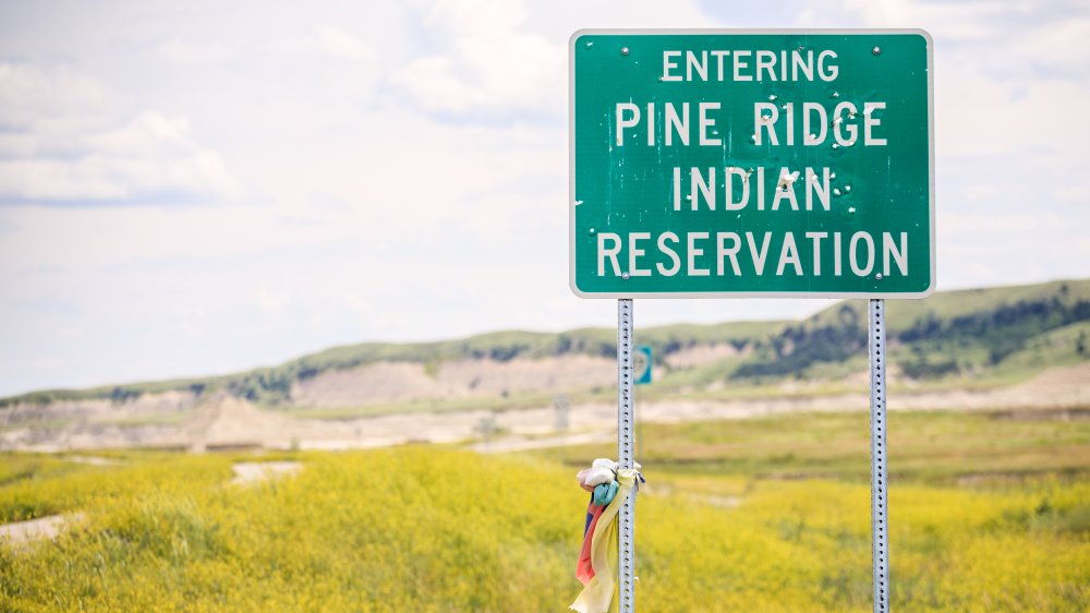 Reservation sign on side of highway