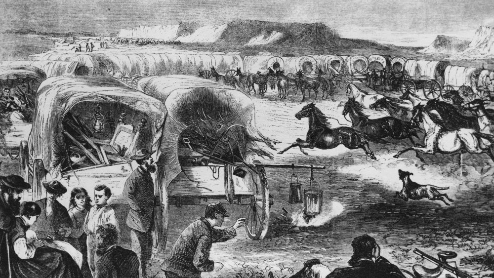 ink drawing of a wagon train on the move