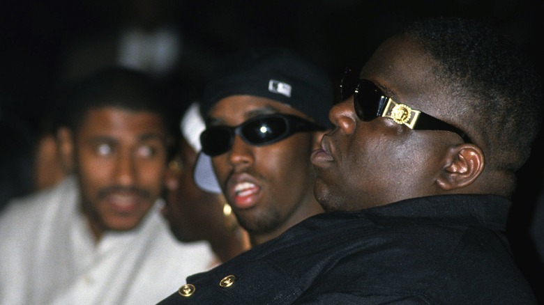Sean Combs and Christopher Wallace watching performance