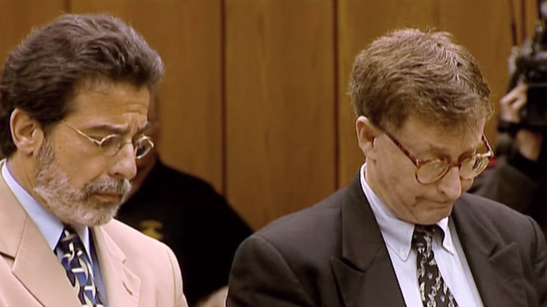 Michael Peterson and David Rudolf listening to the verdict