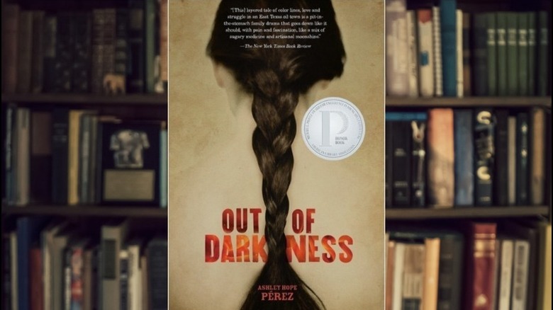 Out of Darkness cover over shelves