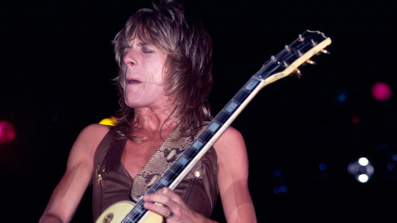 Randy Rhoads emotionally playing guitar