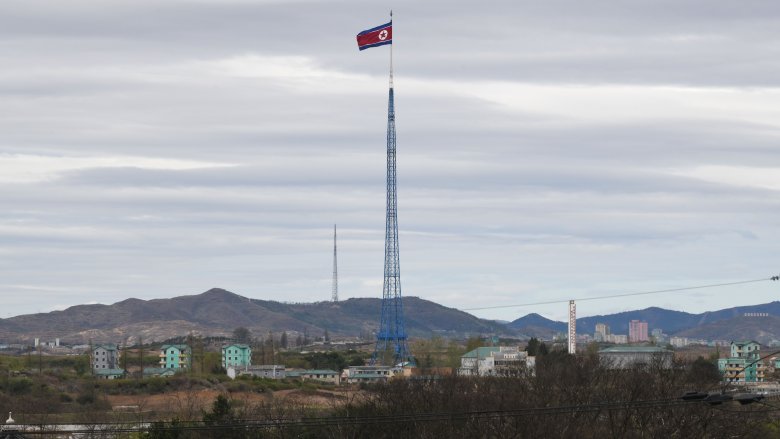 North Korean flag cloudy sky