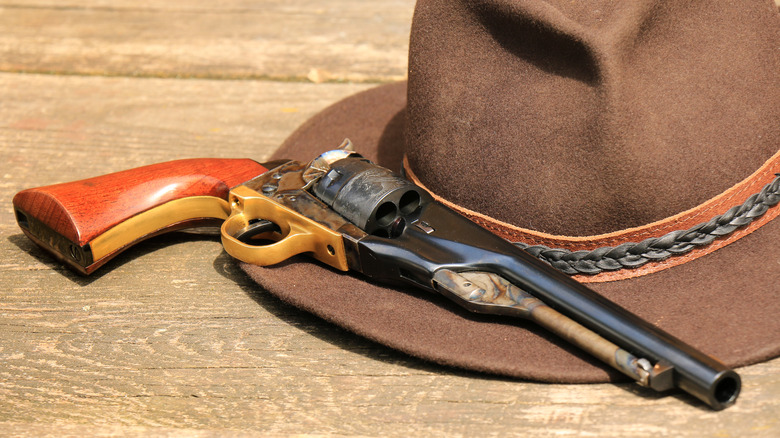 19th century gun and hat