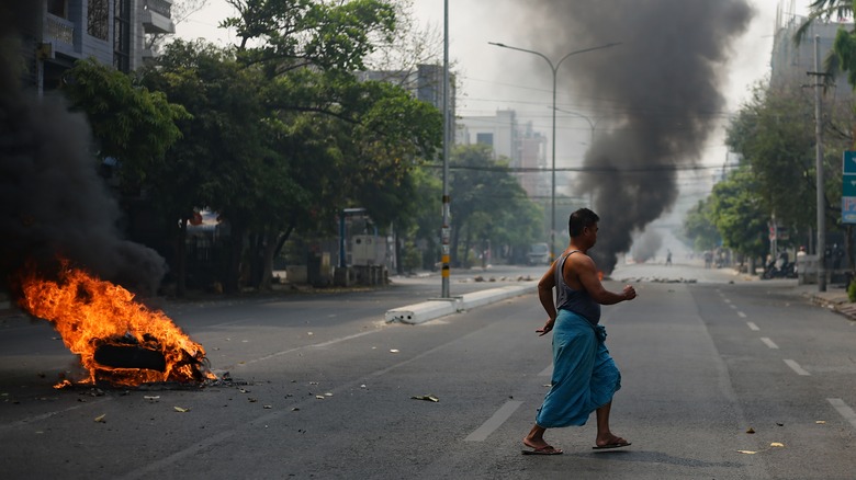 a man running during protests