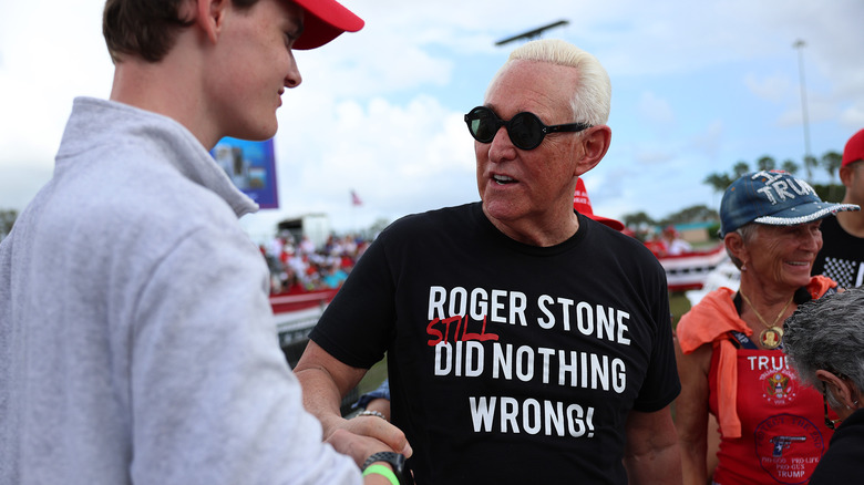 Roger Stone shaking a supporter's hand