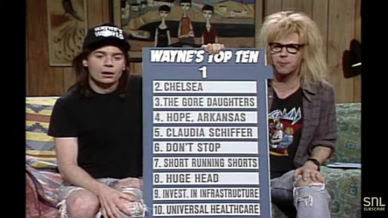 Mike Myers and Dana Carvey sofa holding list board