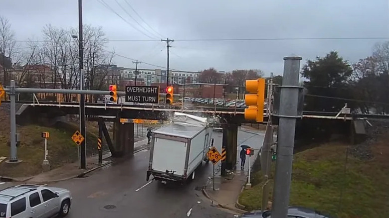 truck crashing into the underneath of bridge