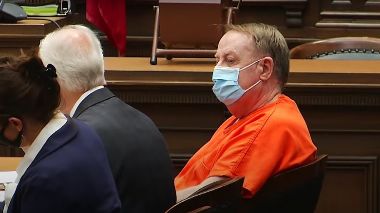 Jerry Burns wearing a mask during his sentencing