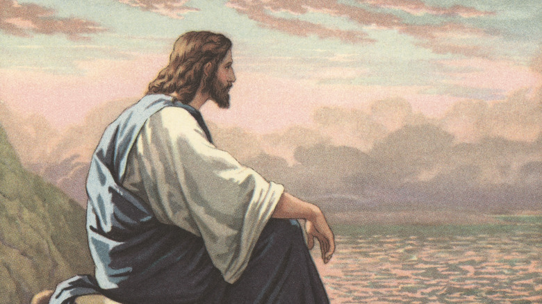 Jesus illustration sat looking over sea