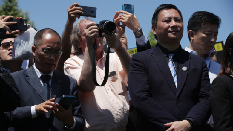  Former Tiananmen student leader Wang Dan listens to remarks