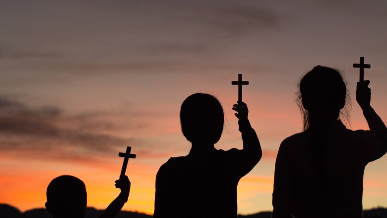 children holding crosses