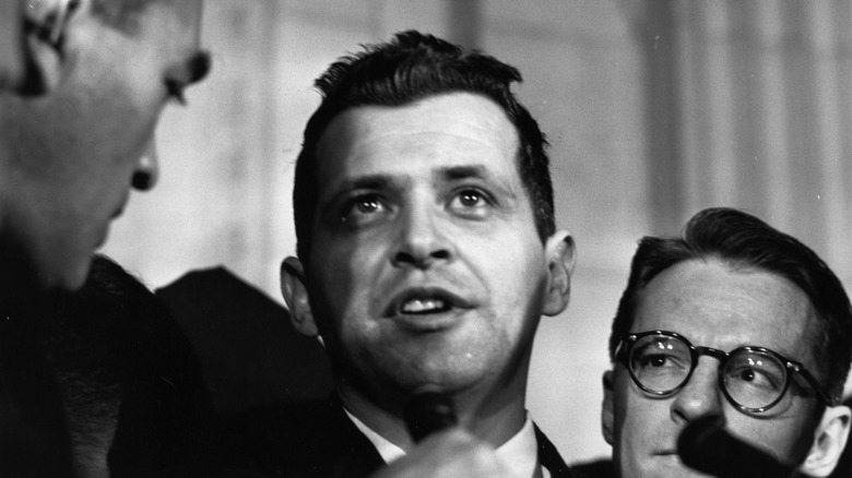 Francis Gary Powers speaking in a microphone