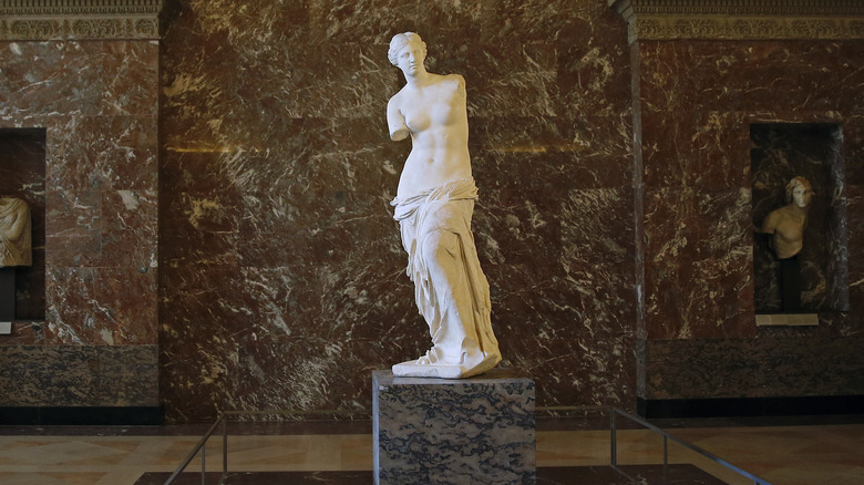 marble statue of Aphrodite known as the Venus de Milo at the Louvre museum 