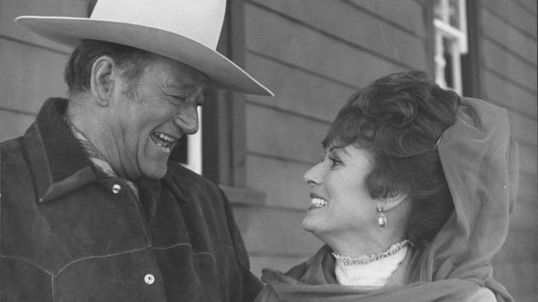 John Wayne laughing with Maureen O'Hara