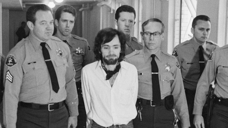 Charlie Manson surrounded by police