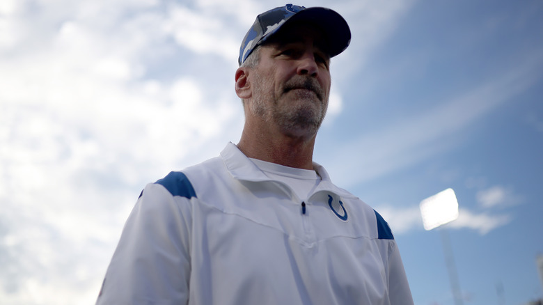 Frank Reich walking off the field with the indianapolis colts