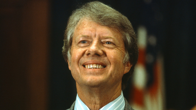 Jimmy Carter smiling in suit