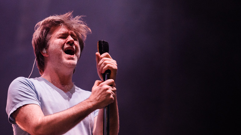 James Murphy singing with mic