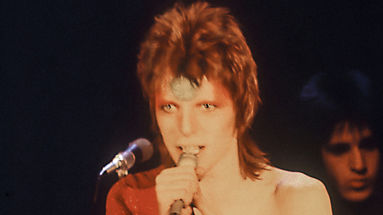 Bowie as Ziggy Stardust at mic