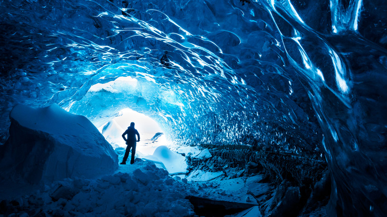 ice cave person glacier Vatnajökull  iceland