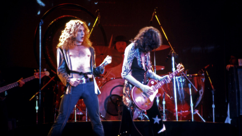 Robert Plant and Jimmy Page perform