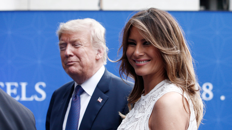 Donald and Melania Trump with weird smiles