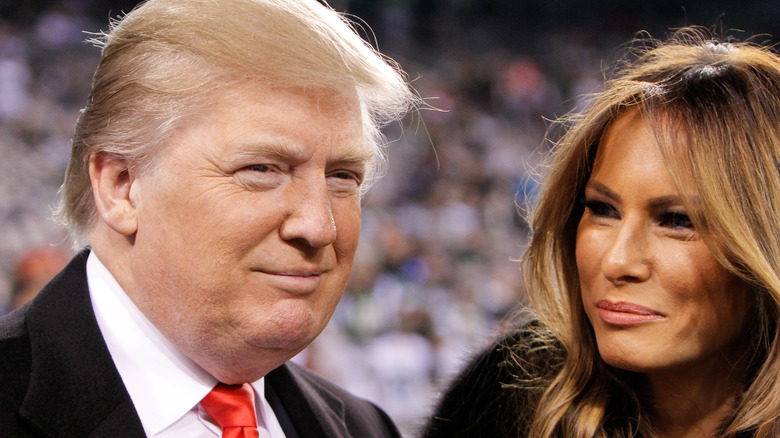 Melania Trump smiling up at Donald Trump