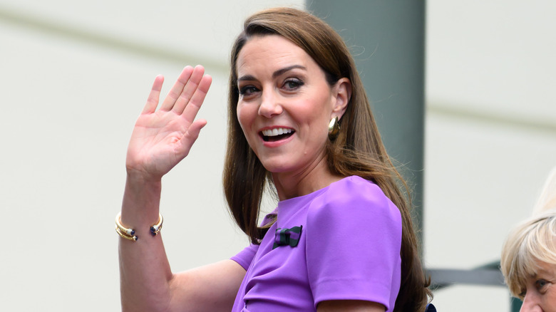 Kate Middleton waving in purple dress