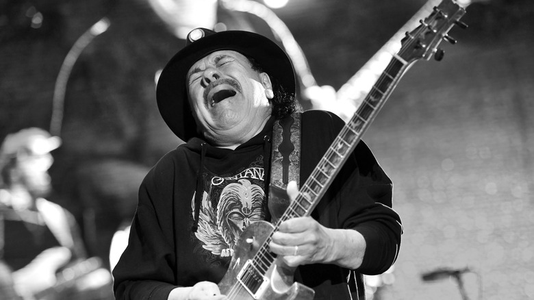 Carlos Santana on stage with guitar