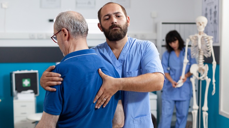 Nurse working on patient's back