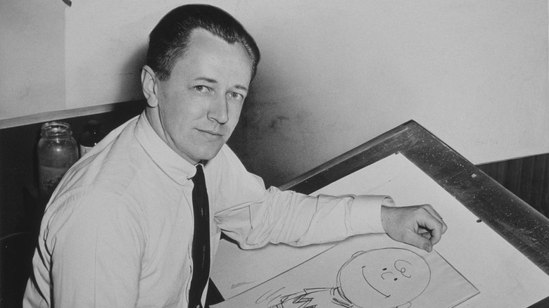 Charles Schulz drawing Charlie Brown
