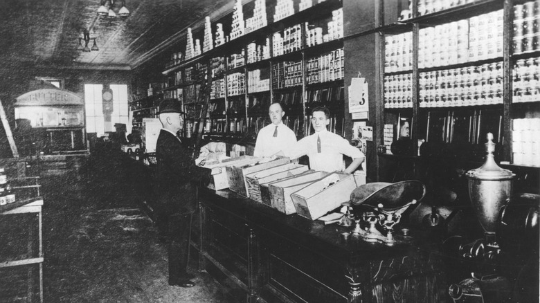 grocery store workers behind counter