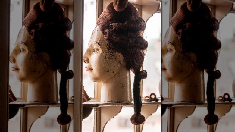 wig mannequin in window