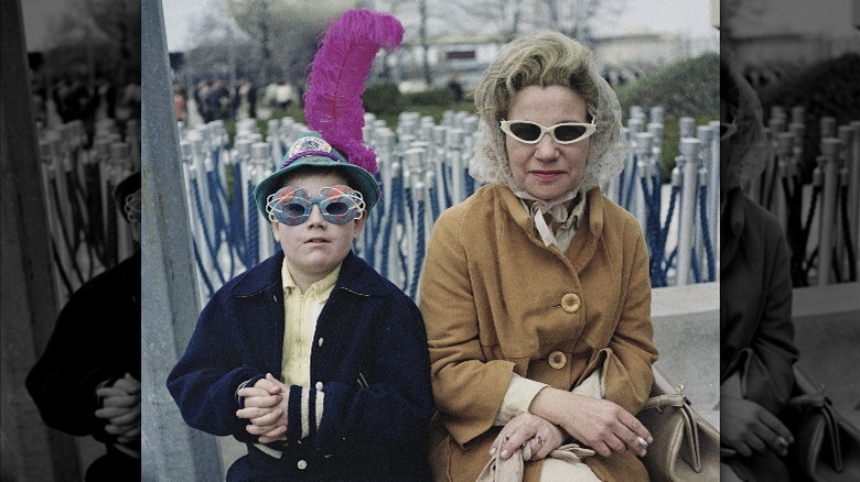 A boy and his mother smiling at the fair 1964