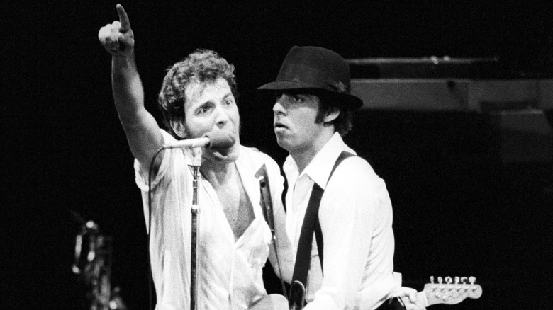 Springsteen and Van Zandt sharing mic onstage